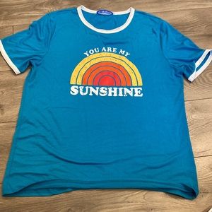 You are my sunshine rainbow 🌈 teal tee accented with white trim XL